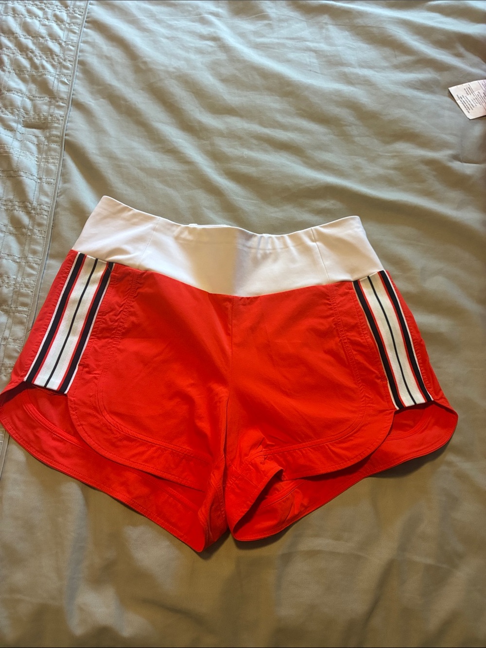 Athleta Red and White Athletic Shorts with Striped Side Panels